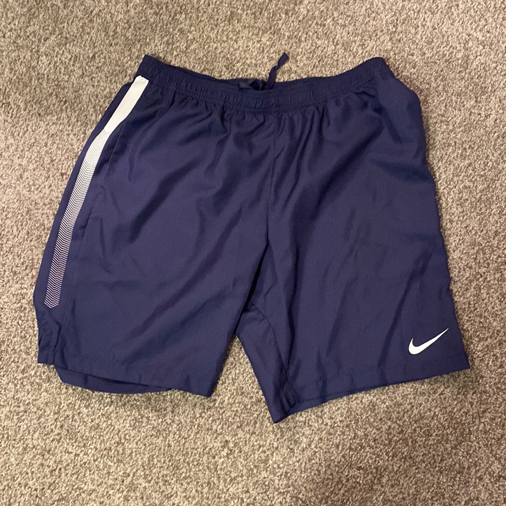 Navy blue Nike shorts.